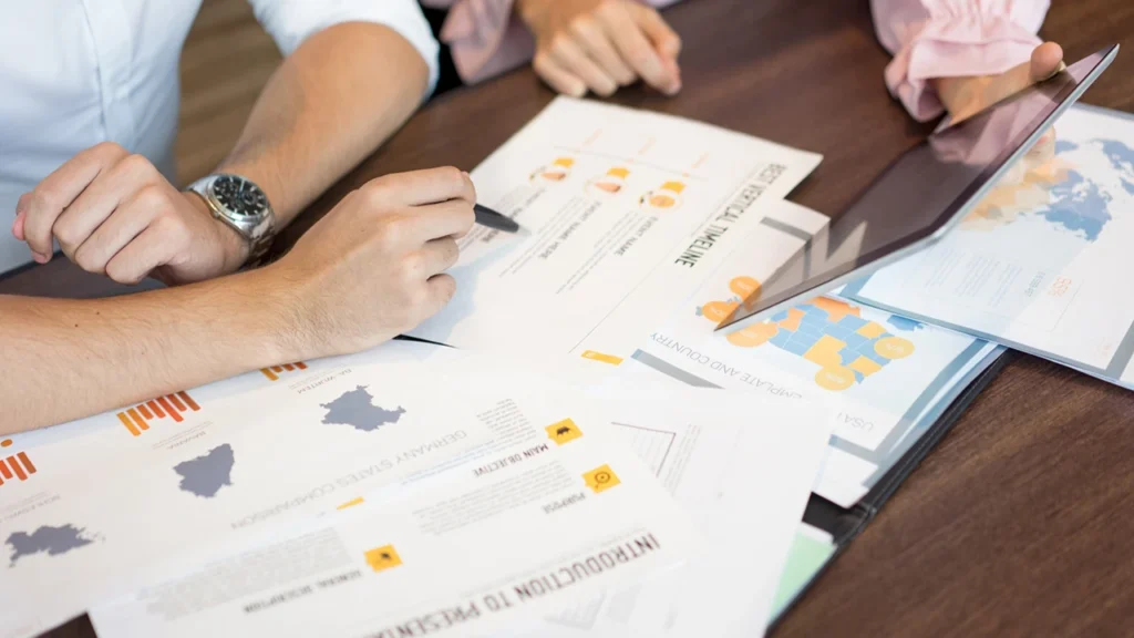 The 4th wheel social impact consultants analyzing organization data reports